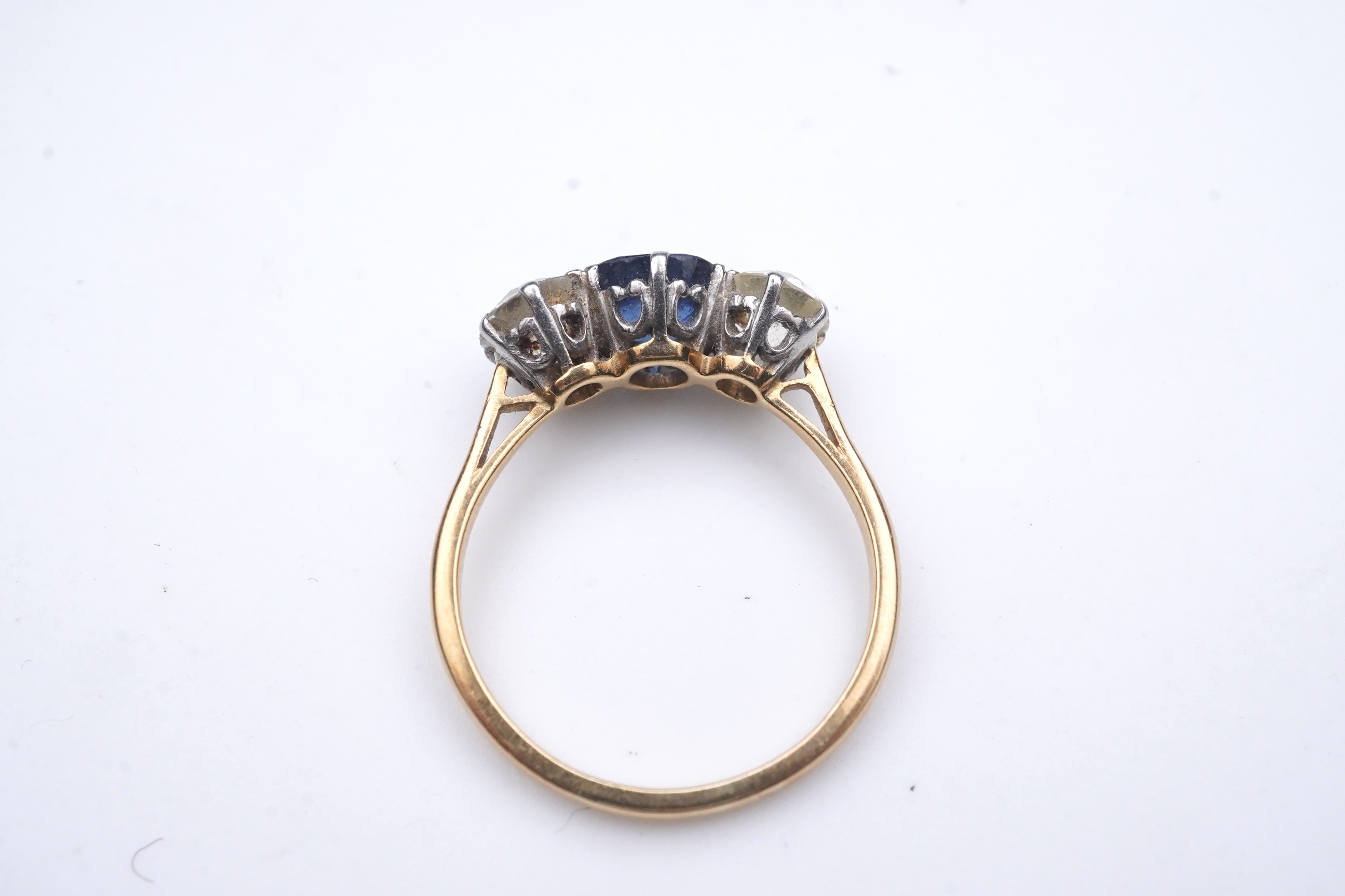 A sapphire and diamond three-stone ring, early 20th century